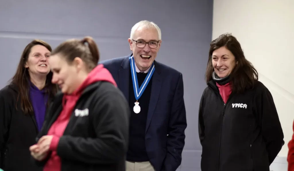 High Sheriff laughing with staff