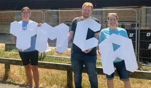 YMCA staff with letters