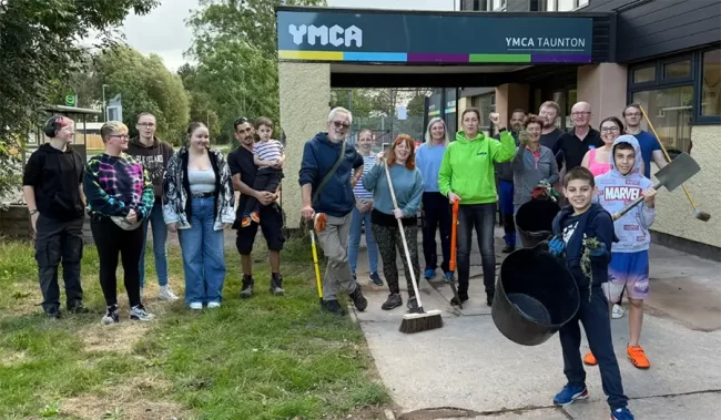 volunteers outside building